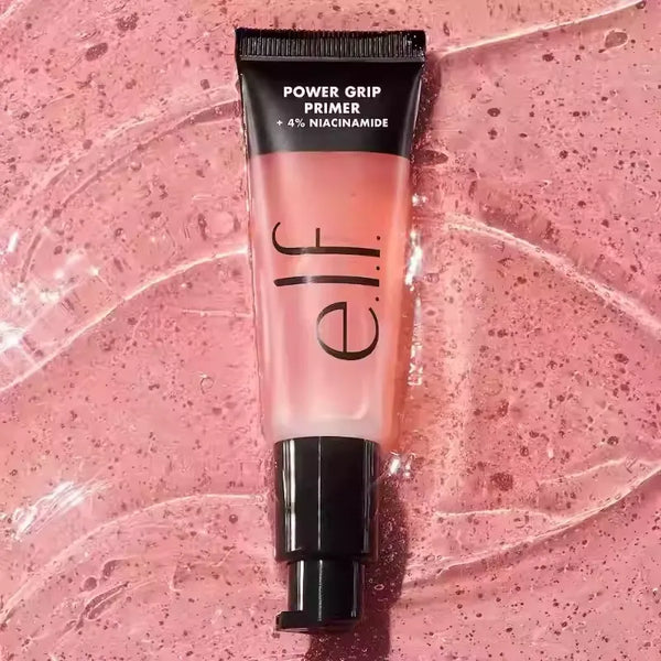 Tube of e.l.f. Power Grip Primer on a pink textured background